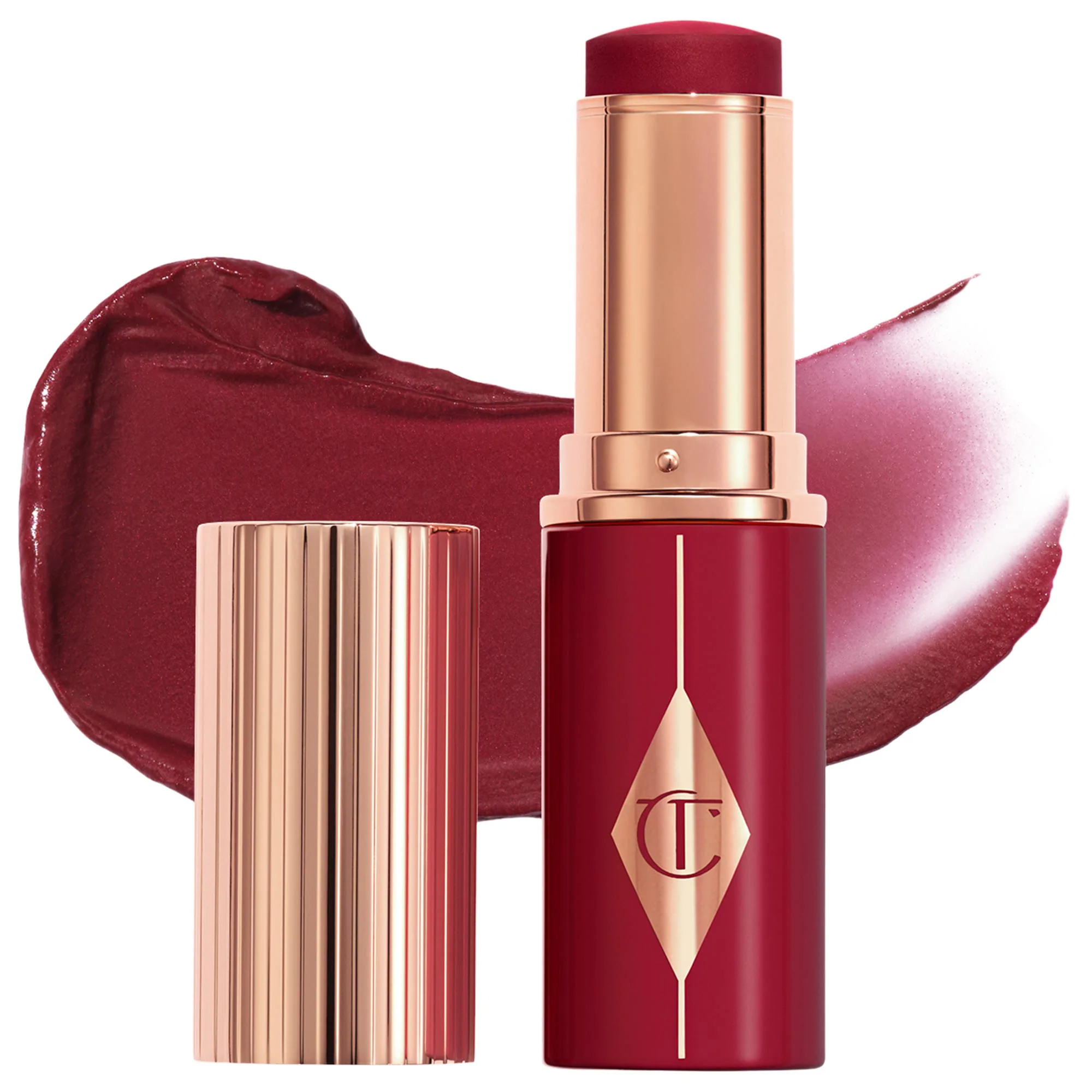 Charlotte Tilbury Unreal Lip + Cheek Glow Blush Stick with Hyaluronic Acid Berry Glow - rich berry