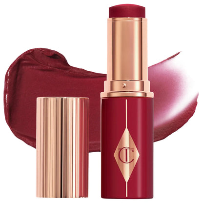 Charlotte Tilbury  Unreal Lip + Cheek Glow Blush Stick with Hyaluronic Acid   Berry Glow - rich berry 